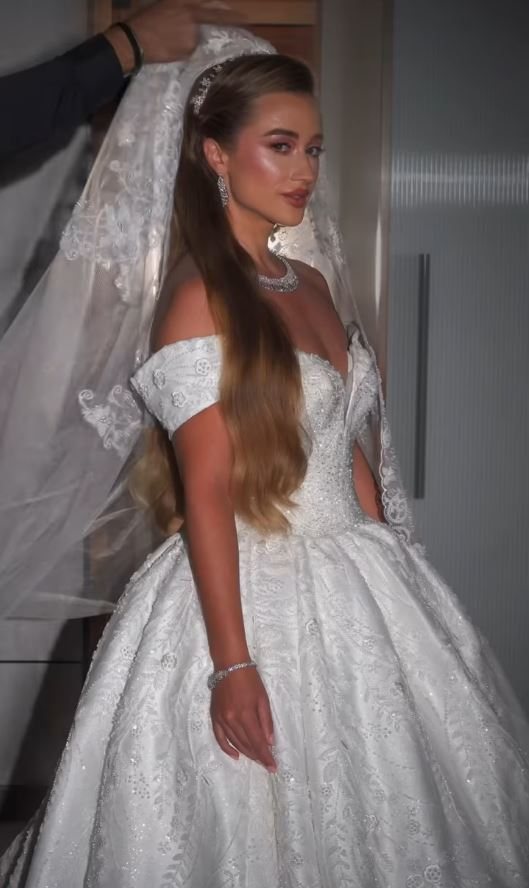 A bride at House of Glam, hair and makeup finished