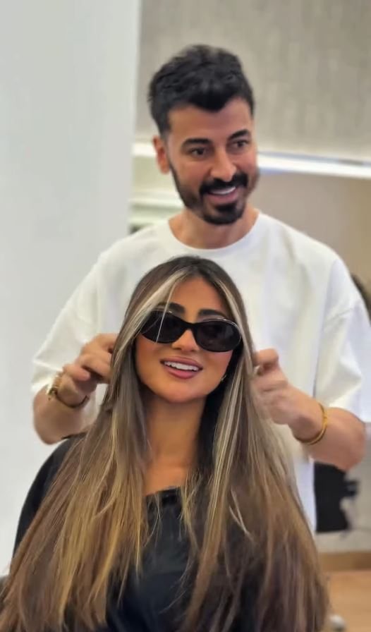 Blonde balayage being finished in the chair